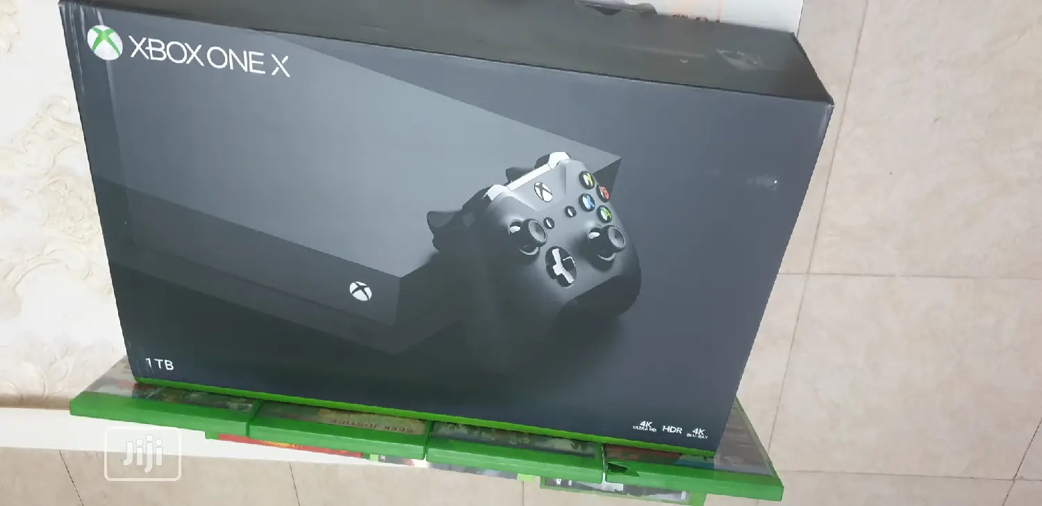 Microsoft Xbox One X 1TB With 8 Latest Game Cd