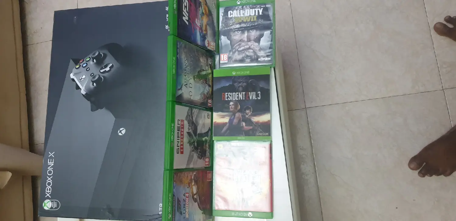 Microsoft Xbox One X 1TB With 8 Latest Game Cd