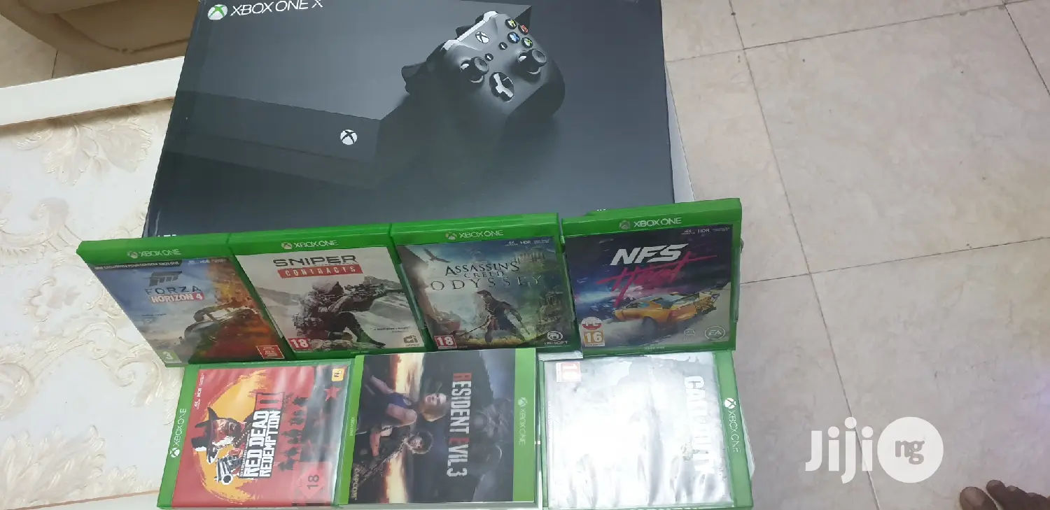 Microsoft Xbox One X 1TB With 8 Latest Game Cd