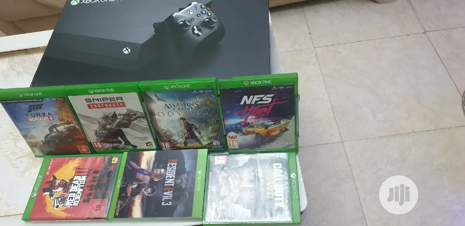 Microsoft Xbox One X 1TB With 8 Latest Game Cd