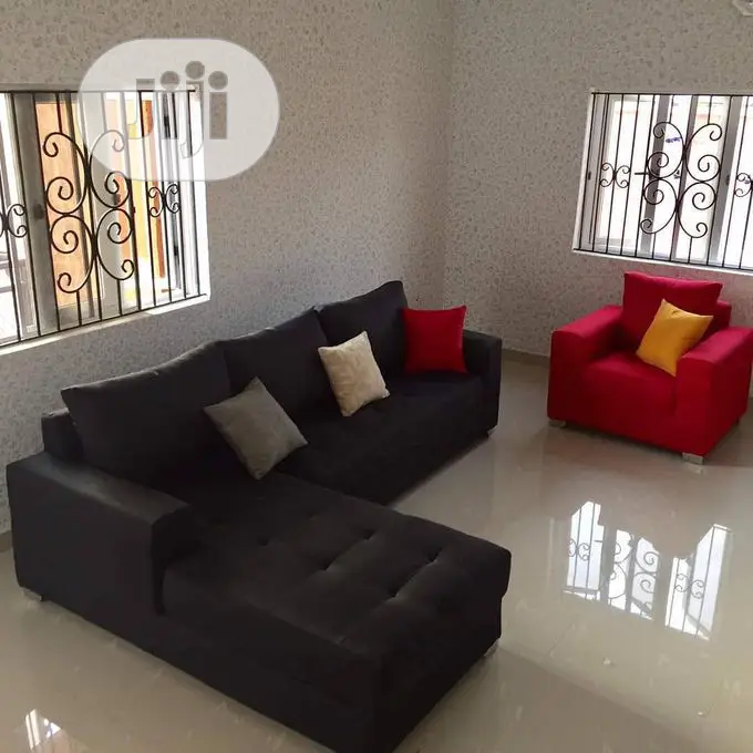 L Shaped Sofa Fabric With Multicolor Pillows