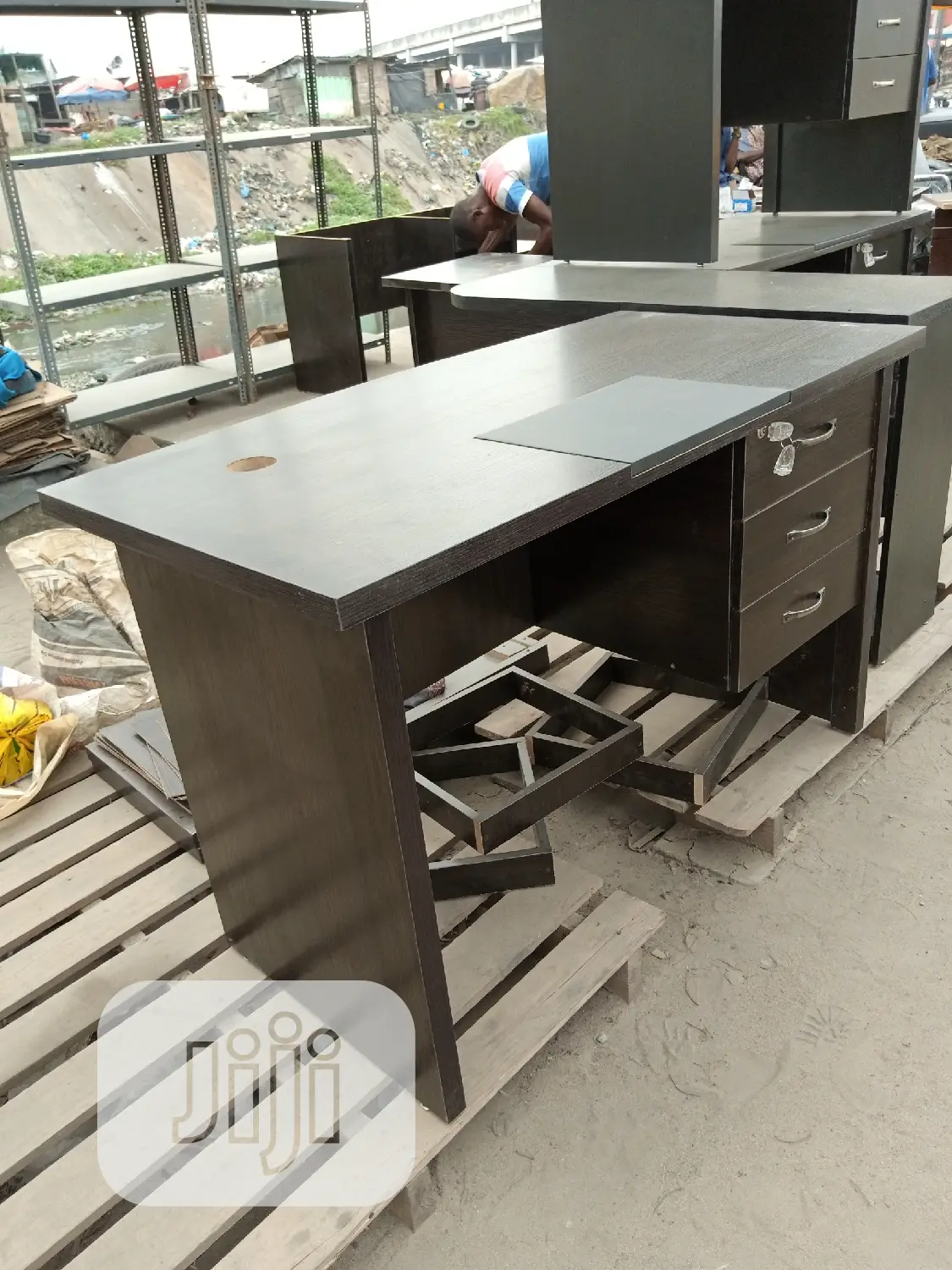 A Four Feet Table With Pad