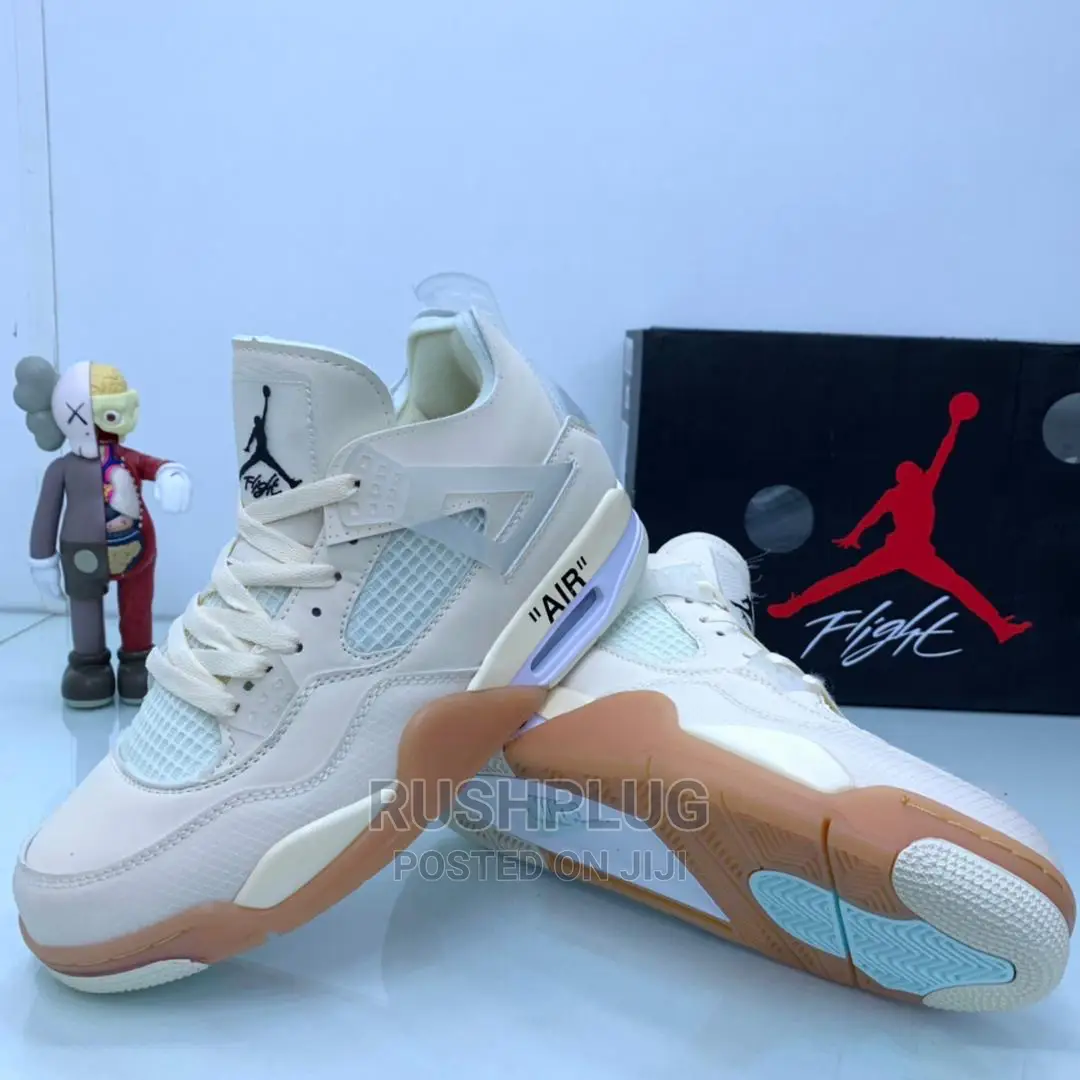 Air Jordan 4 Retro Sail” Sneakers