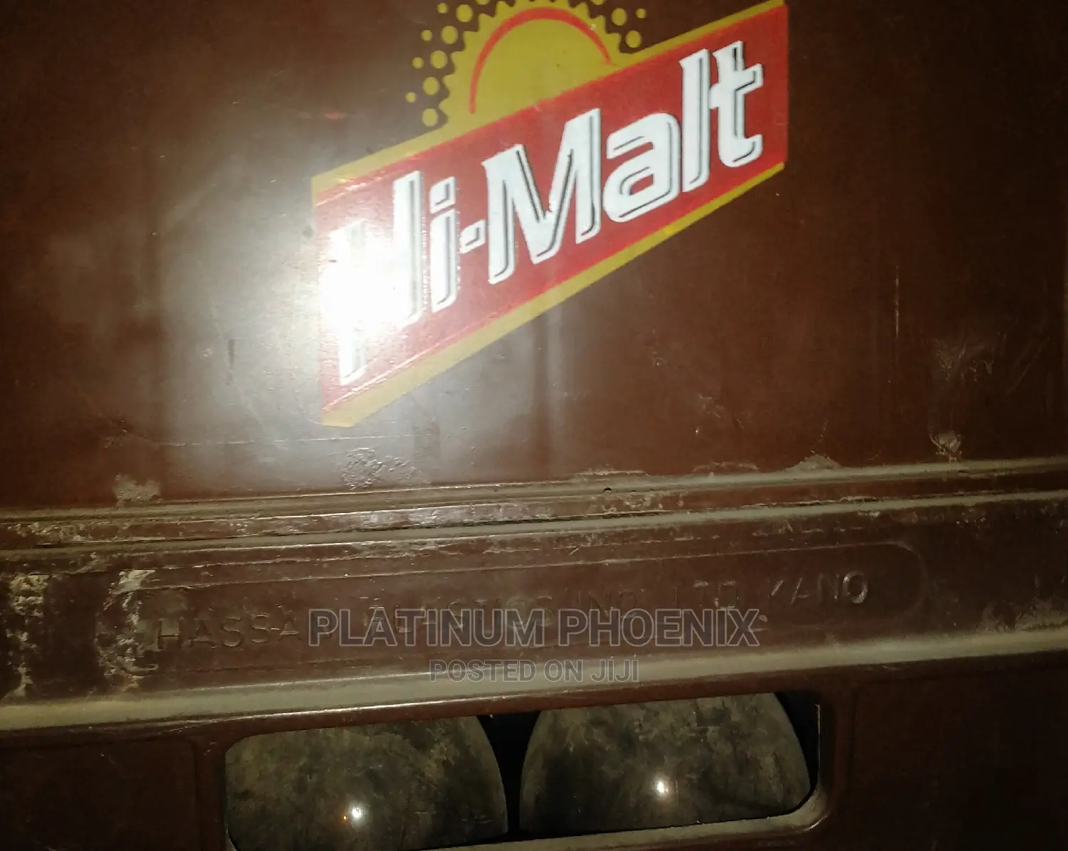 Empty Crate of Hi Malt Bottles