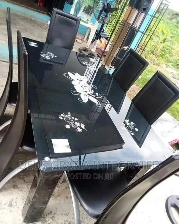 Dinning Table And Chairs By 6