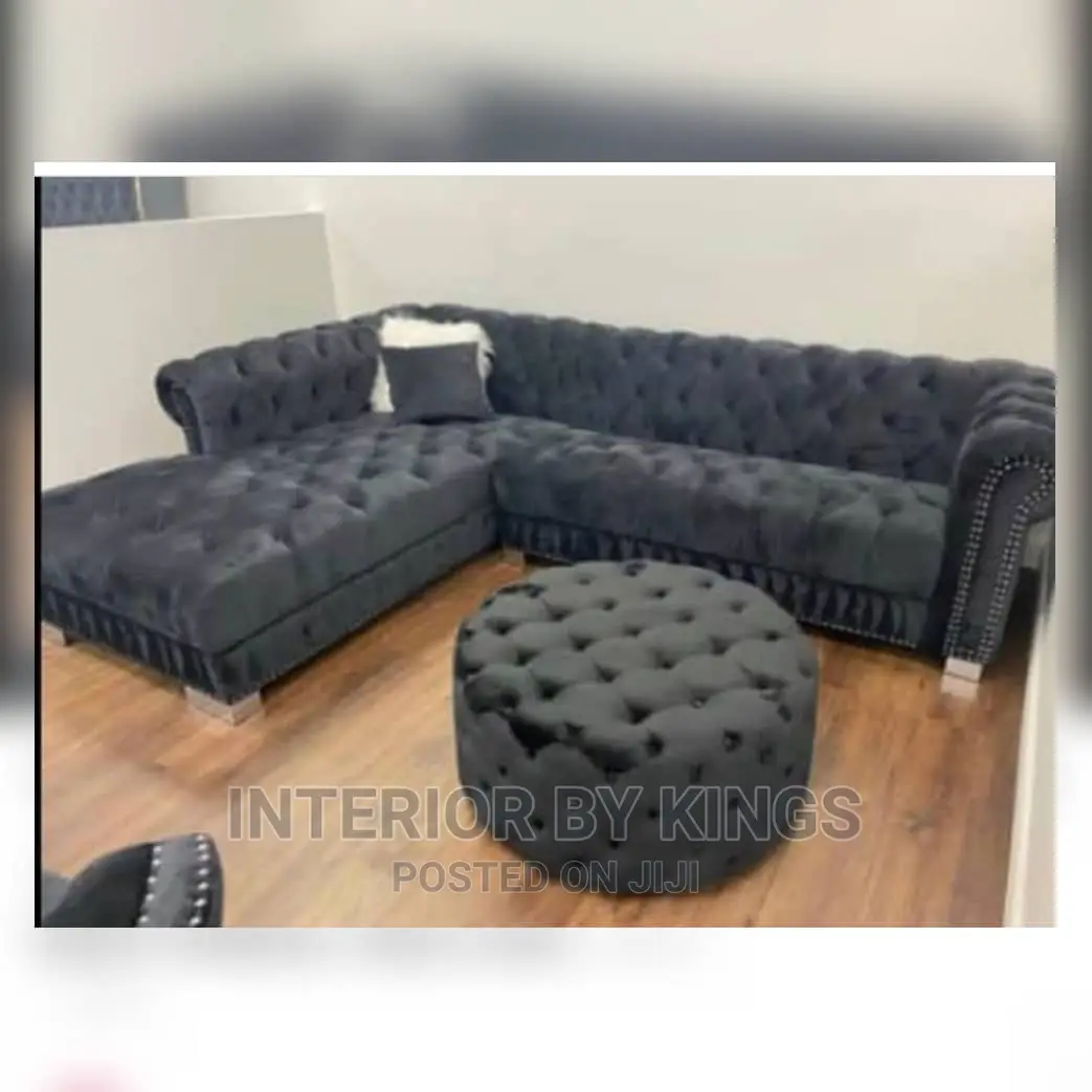 L-Shaped Chesterfield Fabric Sofa With an Ottoman