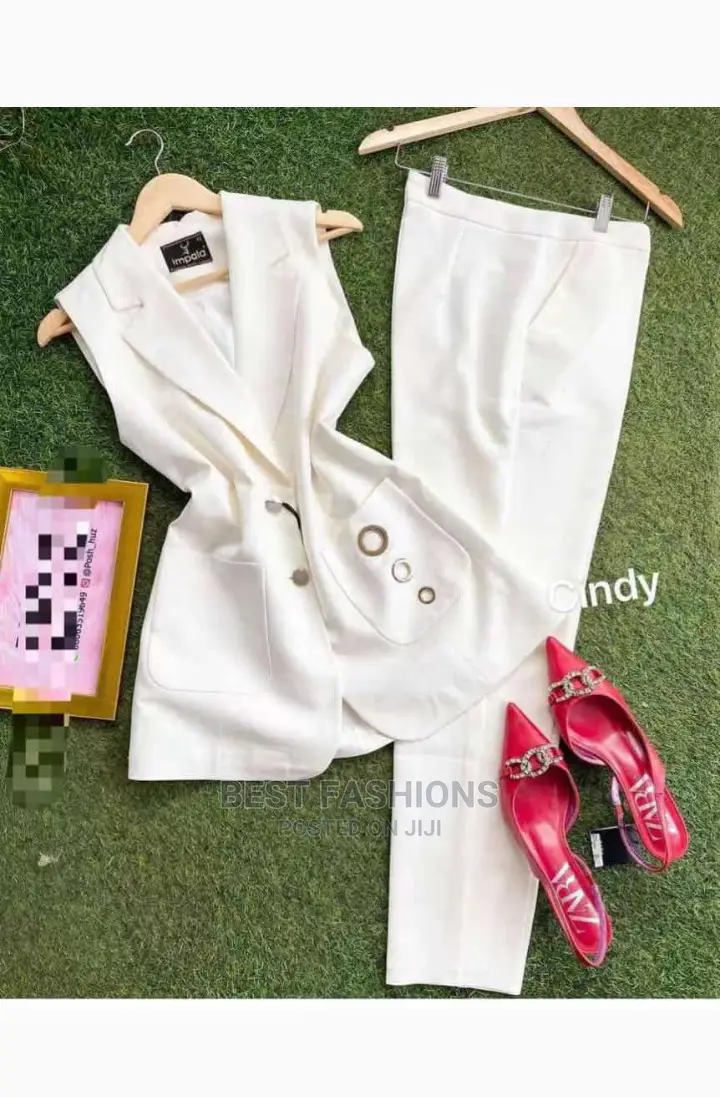 White Female Sleeveless Blazer and Trousers