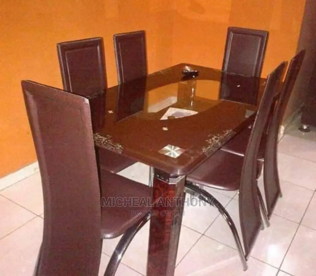 Pedded Glass Dinning Table By 6 Chairs