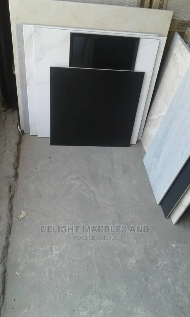 High Grade Glossy 60 by 60 Ceramic Floor Tiles.