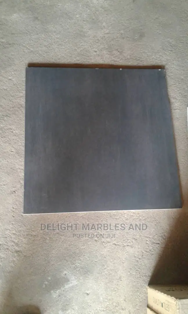 High Grade Glossy 60 by 60 Ceramic Floor Tiles.