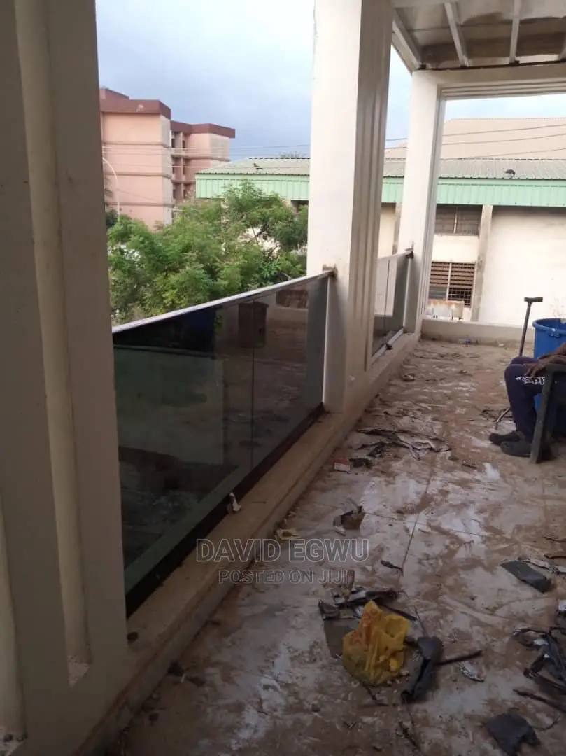 Frameless Balcony With Grey Glass