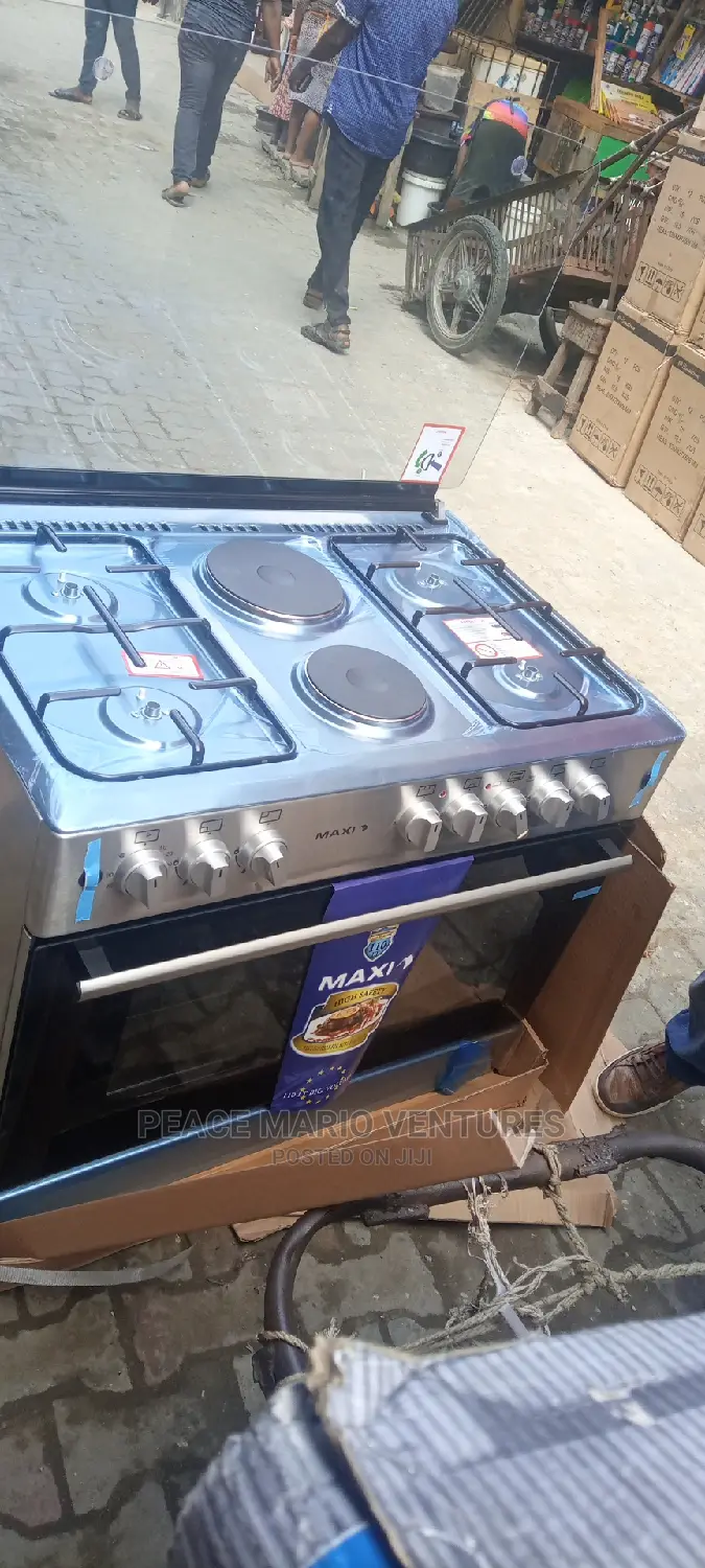 MAXI 90X60 GAS COOKER, 6burners 2electric and 4gas Burner.
