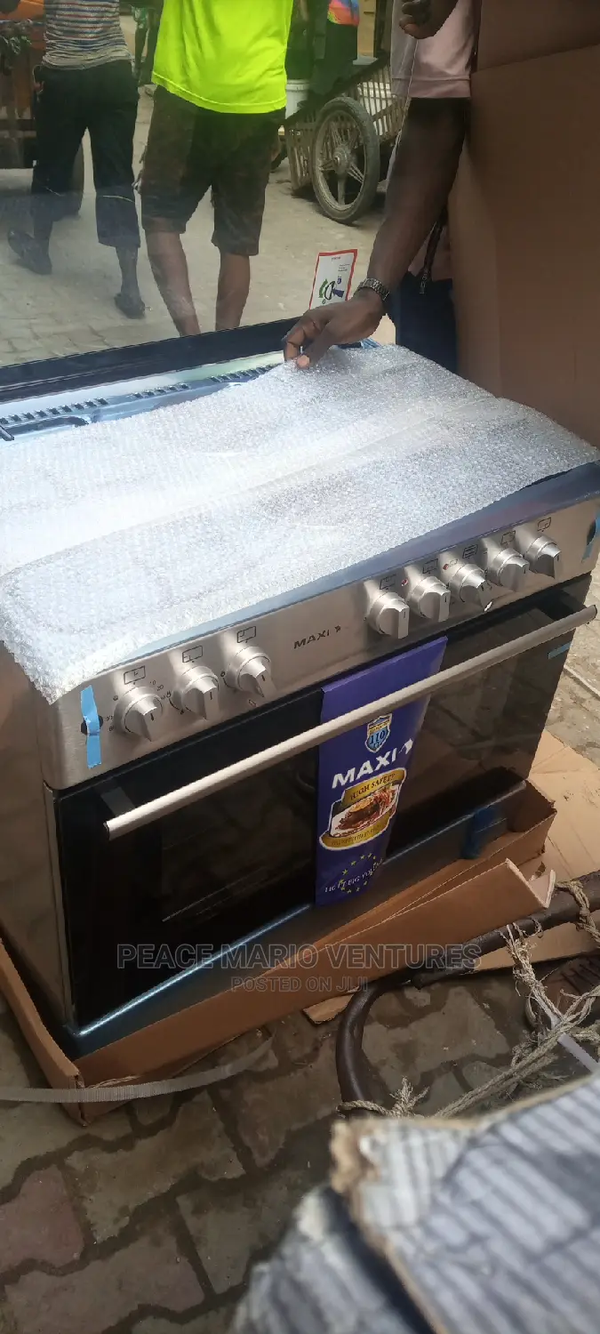 MAXI 90X60 GAS COOKER, 6burners 2electric and 4gas Burner.
