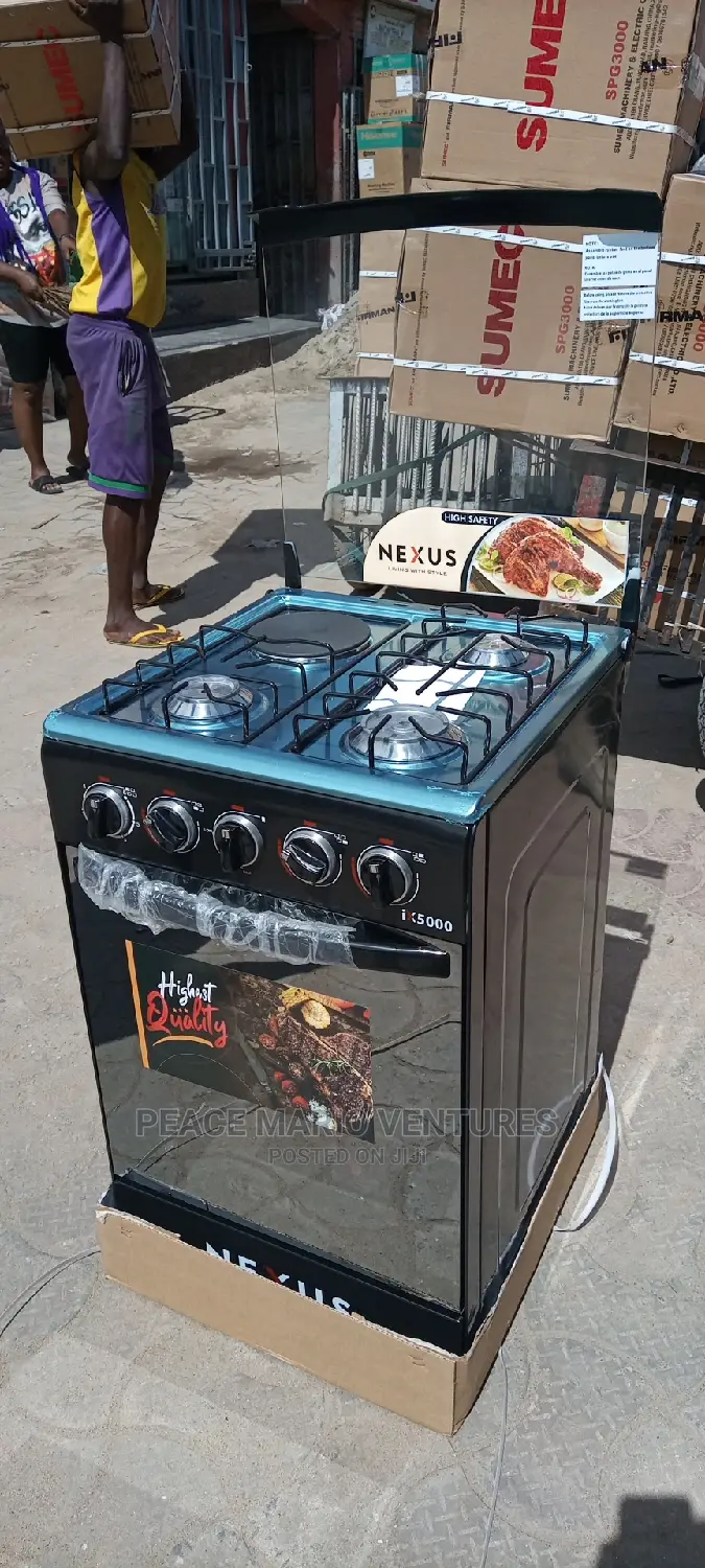 Nexus 3 Gas and 1 Electric Gas Cooker With Oven. Standing.