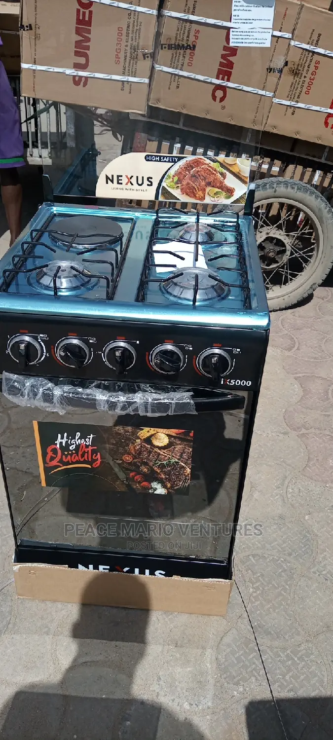 Nexus 3 Gas and 1 Electric Gas Cooker With Oven. Standing.
