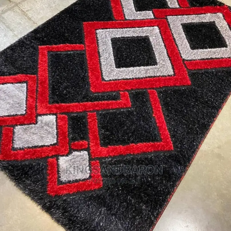 5*7fts Cream and Brown Designed Center Rug.