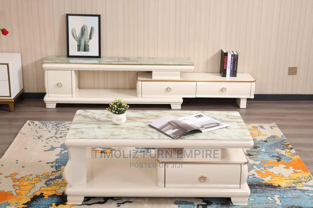Adjustable Tv Stand With Its Tableand Several Storage Spaces