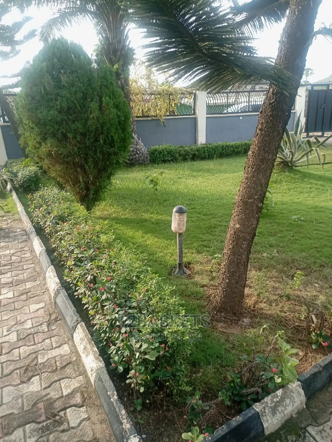 Half Plot of Dry Land Fenced at Beachland Estate Road, Arepo