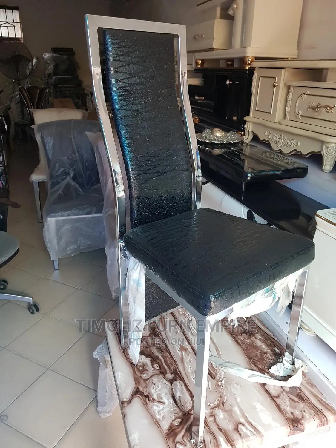 High Quality Dining Chair With Stainless Frame Round It.
