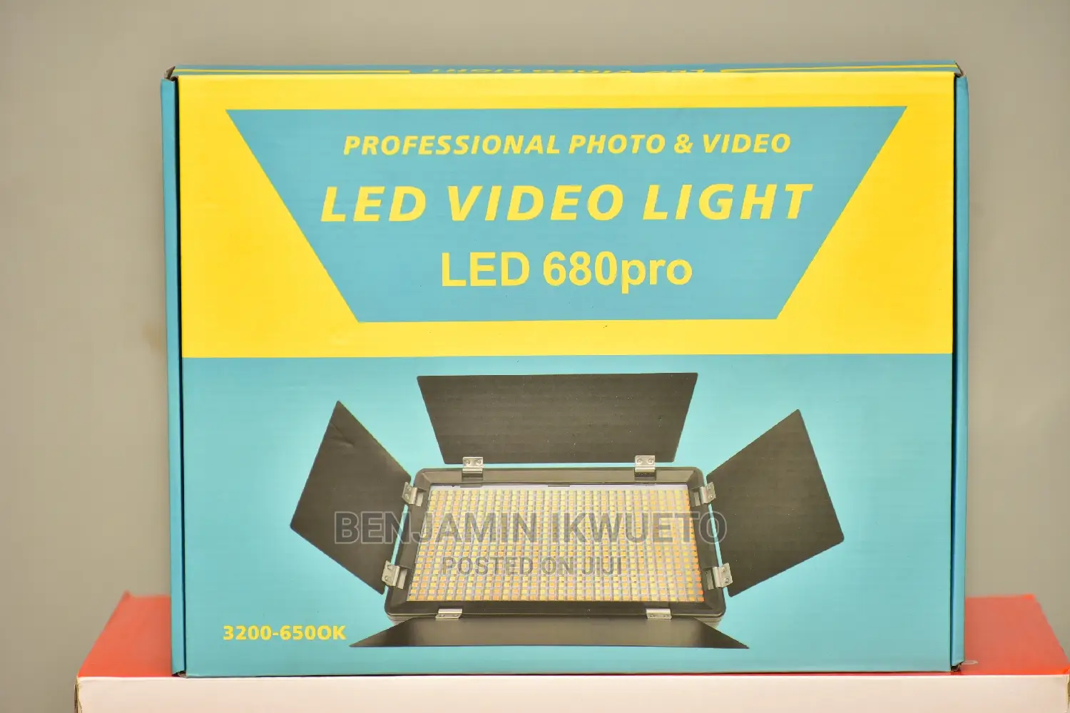 Video Light With Batteries, Charger, and Power Cord.