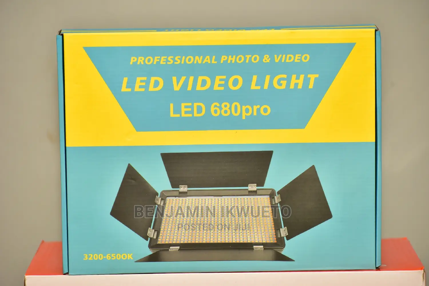 Video Light With Batteries, Charger, and Power Cord.