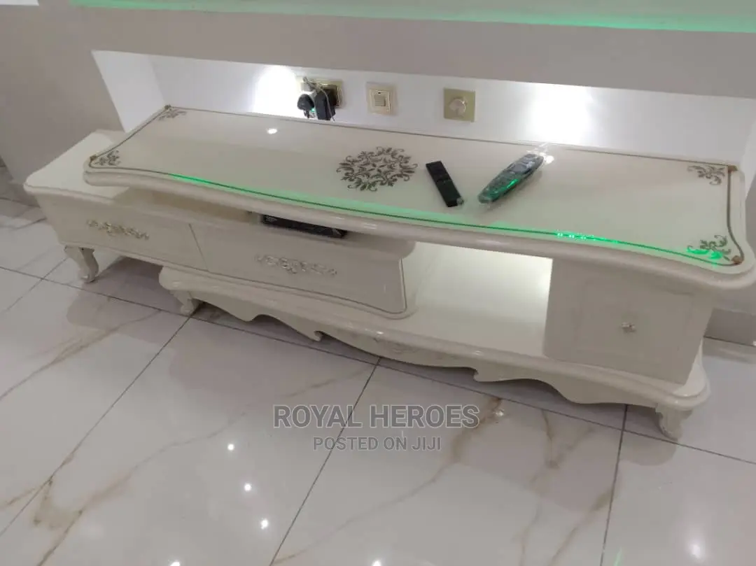 Foreign Glass Top Television Stand